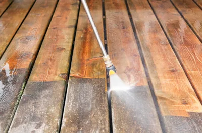 Professional decking cleaning in Worcester, Worcestershire removing algae, dirt, and grime.