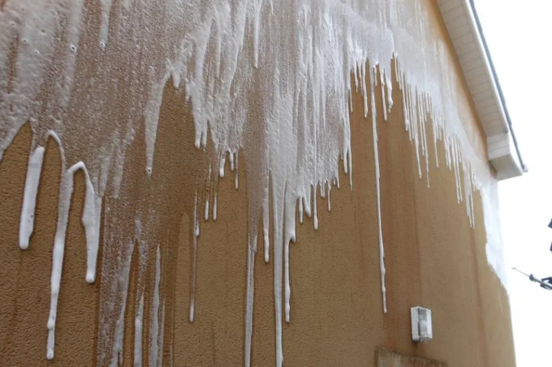 Professional render cleaning in Worcester, Worcestershire removing dirt, algae, and stains from exterior walls.